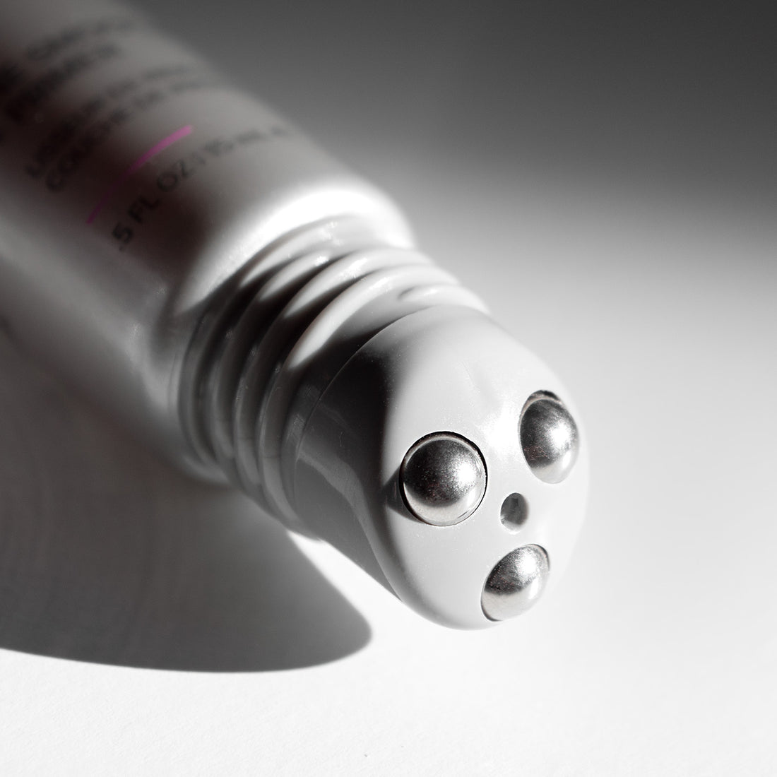 Close-up of roller ball applicator designed to target fine lines with precise, cooling application of Line Smoother Primer.
