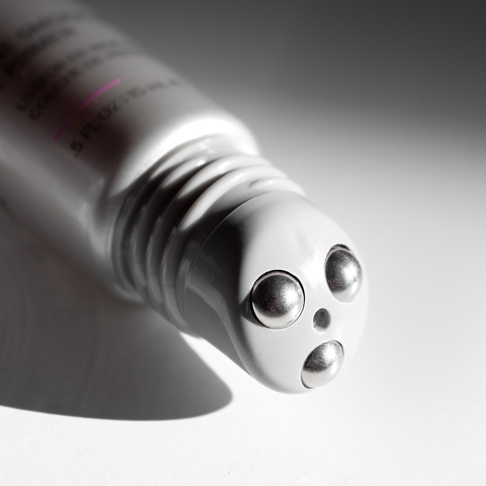 Close-up of roller ball applicator designed to target fine lines with precise, cooling application of Line Smoother Primer.